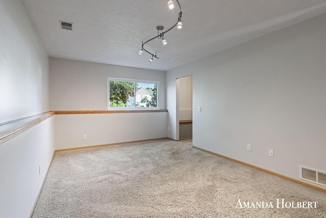430 6th St NE, Cedar Springs, MI 49319 - spare room featuring carpet flooring