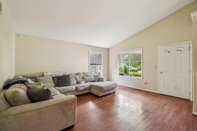 8280 Frederick St, Salem, MI 48175 - living area with dark wood-type flooring and high vaulted ceiling