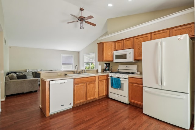 8280 Frederick St, Salem, MI 48175 - kitchen featuring white appliances, open floor plan, a peninsula, a ceiling fan, and light countertops