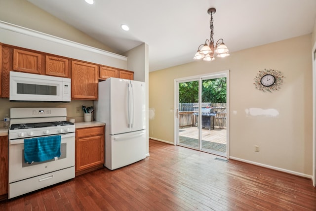 8280 Frederick St, Salem, MI 48175 - kitchen featuring white appliances, brown cabinets, dark wood finished floors, light countertops, and recessed lighting