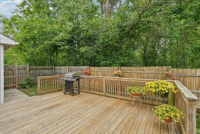 8280 Frederick St, Salem, MI 48175 - wooden terrace featuring a grill and a fenced backyard