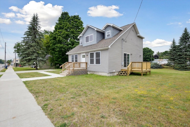313 E Main St, Marion, MI 49665 - view of property exterior featuring a yard, roof with shingles, and a wooden deck