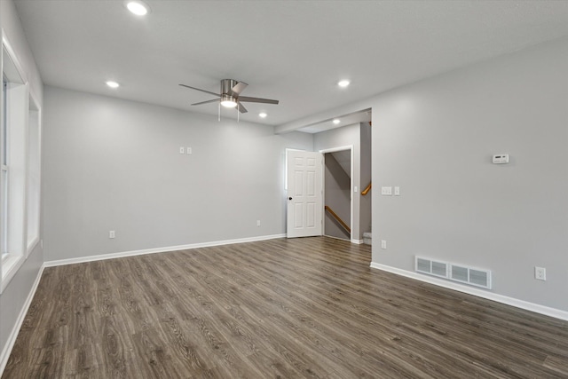 313 E Main St, Marion, MI 49665 - empty room with dark wood finished floors, recessed lighting, and a ceiling fan