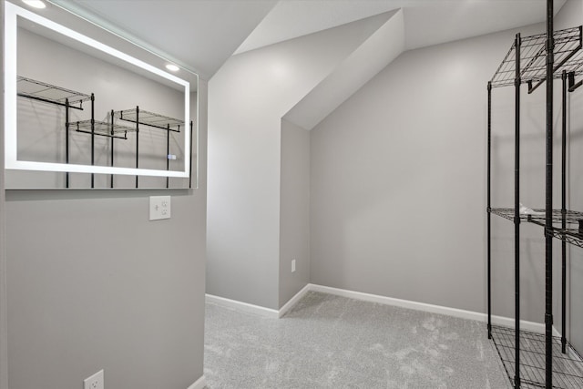 313 E Main St, Marion, MI 49665 - walk in closet featuring carpet floors and lofted ceiling