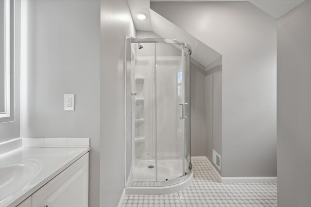313 E Main St, Marion, MI 49665 - bathroom featuring a stall shower and vanity