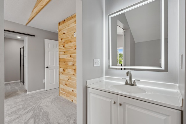 313 E Main St, Marion, MI 49665 - bathroom with vanity and baseboards