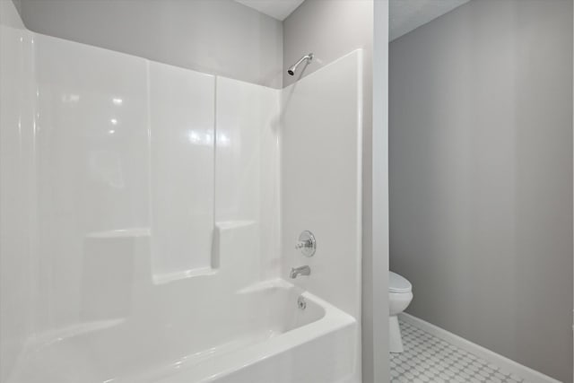 313 E Main St, Marion, MI 49665 - full bathroom featuring  shower combination and tile patterned floors