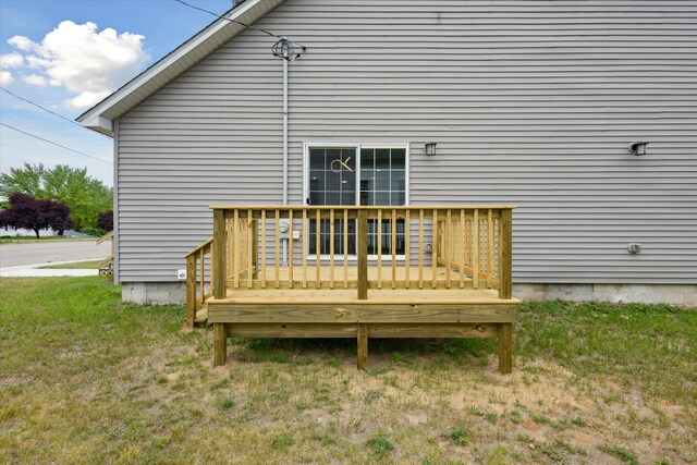 313 E Main St, Marion, MI 49665 - back of house featuring a deck