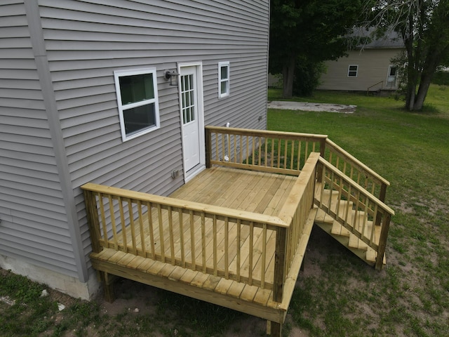 313 E Main St, Marion, MI 49665 - wooden deck with a lawn and stairway