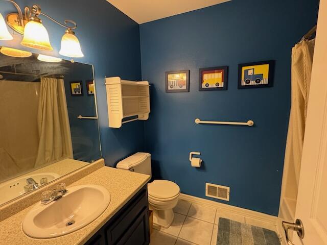 5689 Rothbury Ct, Ypsilanti, MI 48197 - full bathroom with vanity, tile patterned floors, and a shower with curtain