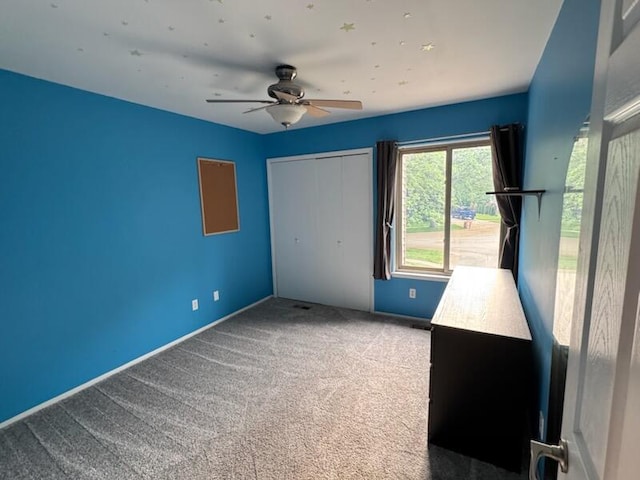 5689 Rothbury Ct, Ypsilanti, MI 48197 - unfurnished bedroom with carpet flooring, a closet, and a ceiling fan