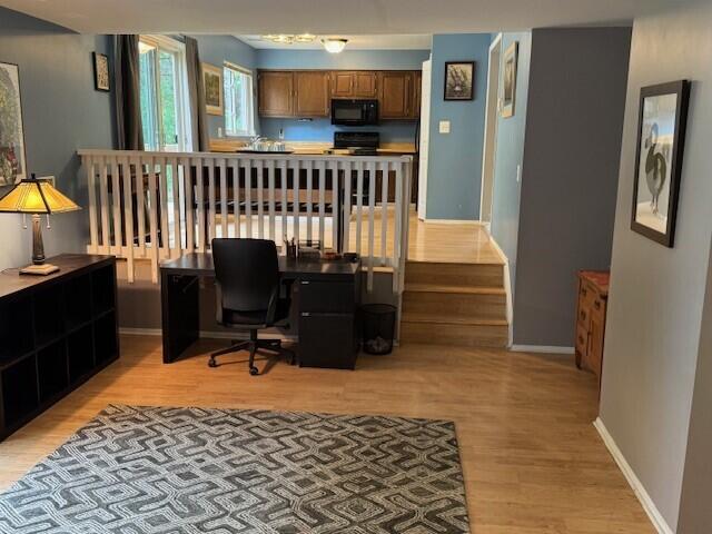 5689 Rothbury Ct, Ypsilanti, MI 48197 - office featuring light wood-style flooring and baseboards
