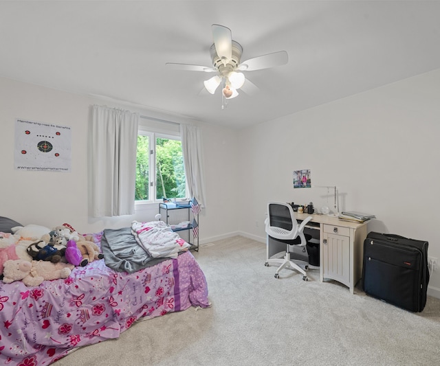 7624 Quail Ridge Dr, Dexter, MI 48130 - bedroom featuring light colored carpet, ceiling fan, and a desk