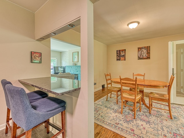 219 Park St, Tecumseh, MI 49286 - dining area featuring wood finished floors and baseboards