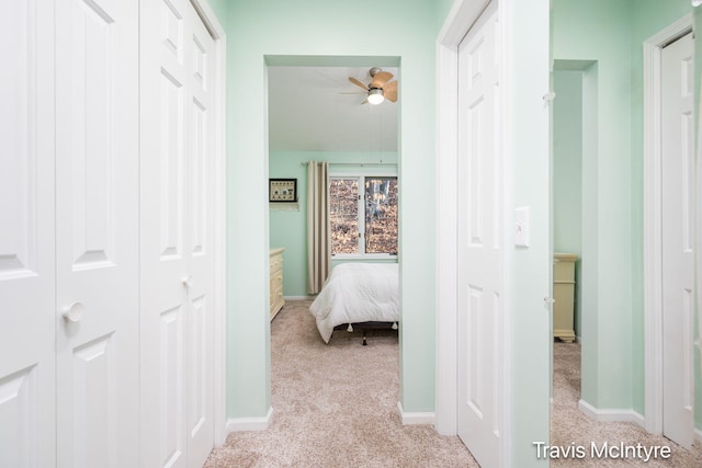 17909 Hidden Dunes Ln Unit B, Spring Lake, MI 49456 - corridor featuring light colored carpet and baseboards