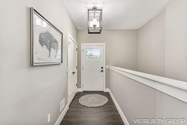 13407 152nd Ave, Grand Haven, MI 49417 - doorway featuring dark wood-type flooring and baseboards
