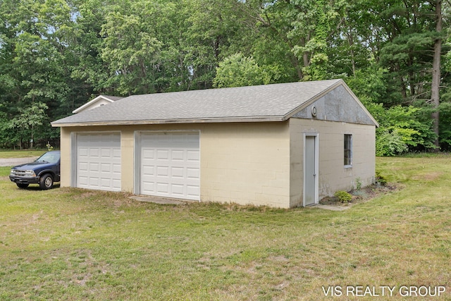13407 152nd Ave, Grand Haven, MI 49417 - detached garage with view of wooded area