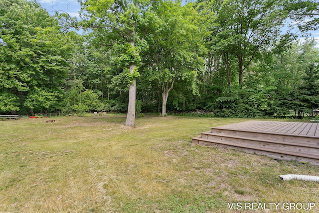 13407 152nd Ave, Grand Haven, MI 49417 - view of green lawn featuring a deck