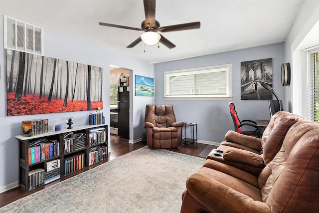 1198 Hawthorne Ave, Ypsilanti, MI 48198 - living area featuring a ceiling fan and wood finished floors