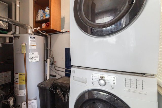 1198 Hawthorne Ave, Ypsilanti, MI 48198 - laundry area with gas water heater and stacked washer and clothes dryer