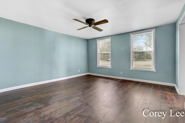 413 W Riverside Dr, Ionia, MI 48846 - unfurnished room with ceiling fan and dark wood finished floors