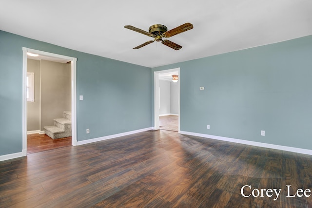 413 W Riverside Dr, Ionia, MI 48846 - spare room featuring ceiling fan, stairs, and wood finished floors