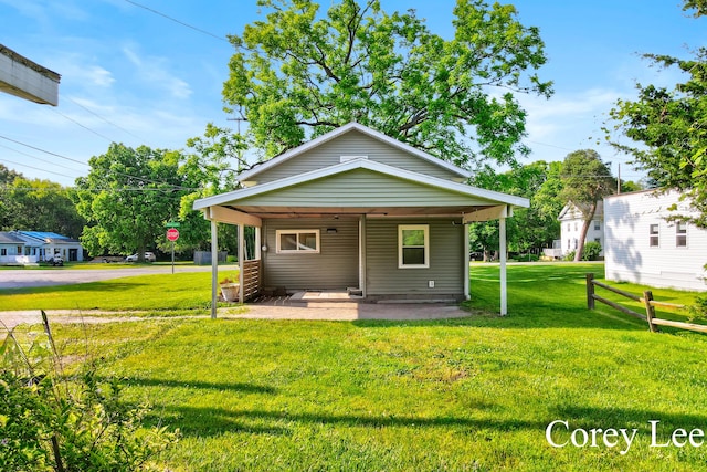 413 W Riverside Dr, Ionia, MI 48846 - view of front of property featuring a front lawn