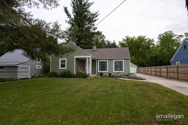 5161 Grand River Dr NE, Grand Rapids, MI 49525 - view of front of home featuring a detached garage