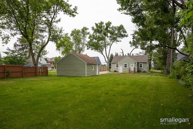 5161 Grand River Dr NE, Grand Rapids, MI 49525 - view of yard with an outdoor structure