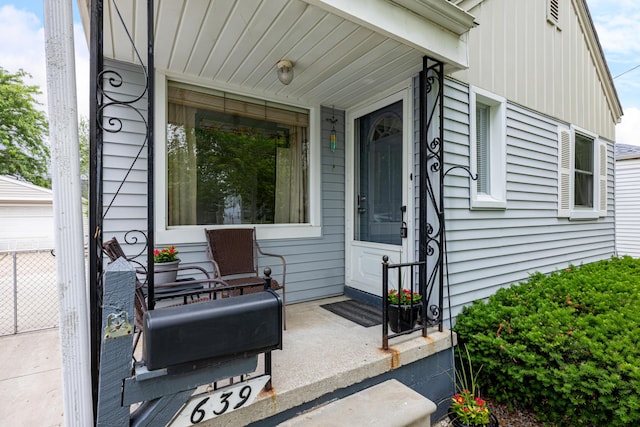 639 Cleveland, Lincoln Park, MI 48146 - property entrance featuring board and batten siding