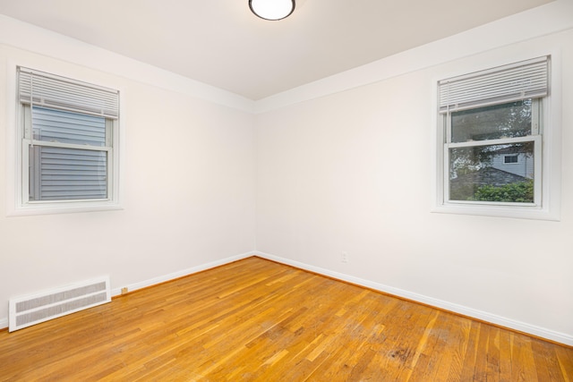 639 Cleveland, Lincoln Park, MI 48146 - spare room with baseboards and light wood finished floors