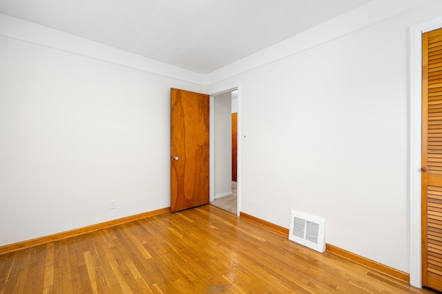 639 Cleveland, Lincoln Park, MI 48146 - unfurnished bedroom with light wood finished floors and a closet