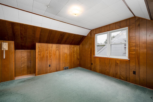 639 Cleveland, Lincoln Park, MI 48146 - additional living space with wood walls, vaulted ceiling, and carpet floors