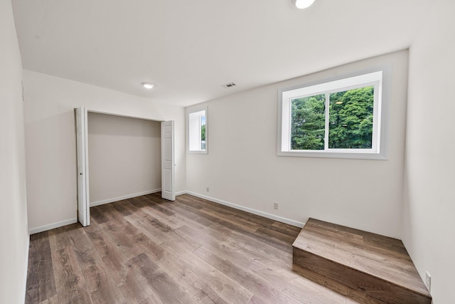 13060 Broadway Rd, Three Rivers, MI 49093 - unfurnished bedroom with wood finished floors and a closet