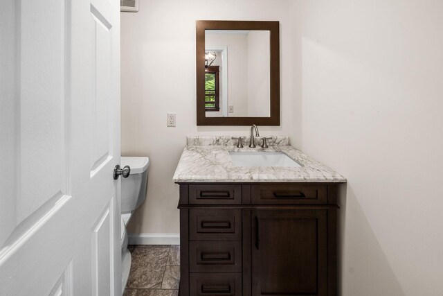 13060 Broadway Rd, Three Rivers, MI 49093 - bathroom featuring baseboards and vanity