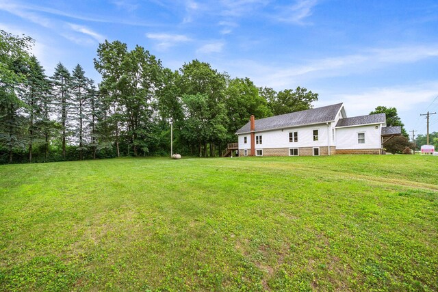 13060 Broadway Rd, Three Rivers, MI 49093 - view of green lawn with a deck