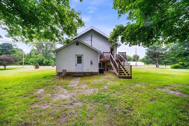 13060 Broadway Rd, Three Rivers, MI 49093 - rear view of property with stairs, a wooden deck, and a yard