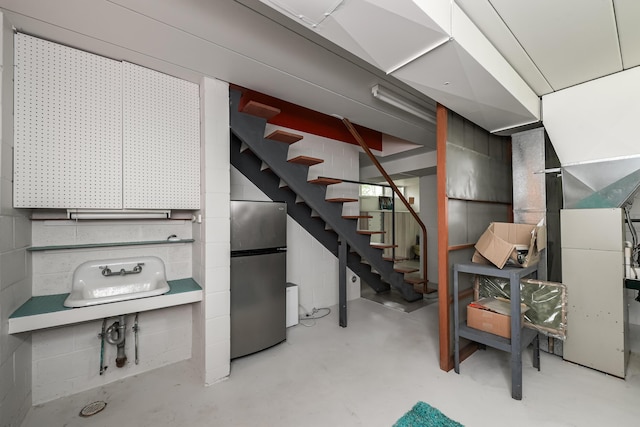 4075 N Delhi Rd, Ann Arbor, MI 48103 - basement with freestanding refrigerator and stairs