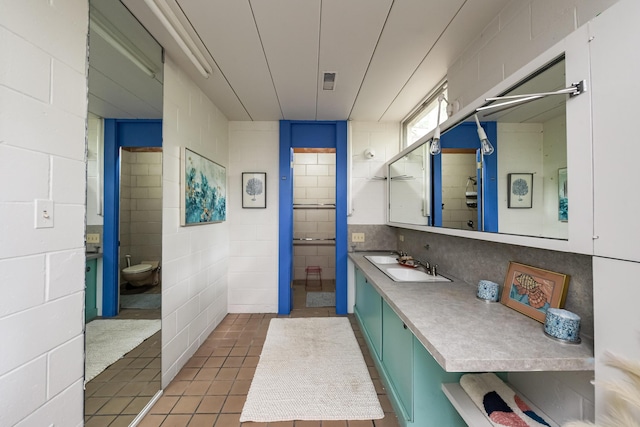 4075 N Delhi Rd, Ann Arbor, MI 48103 - bathroom featuring vanity and tile patterned flooring