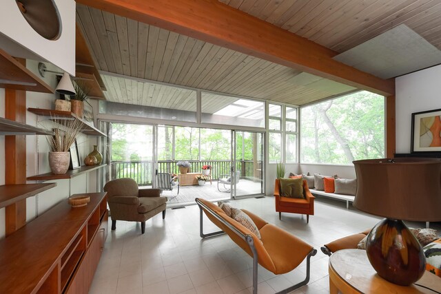 4075 N Delhi Rd, Ann Arbor, MI 48103 - sunroom featuring outdoor lounge area, healthy amount of natural light, a wall of windows, tile patterned floors, and a wood ceiling with exposed beams