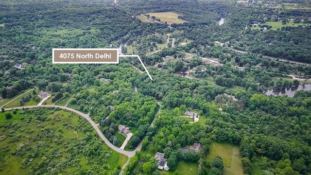 4075 N Delhi Rd, Ann Arbor, MI 48103 - aerial view of property's location featuring a heavily wooded area