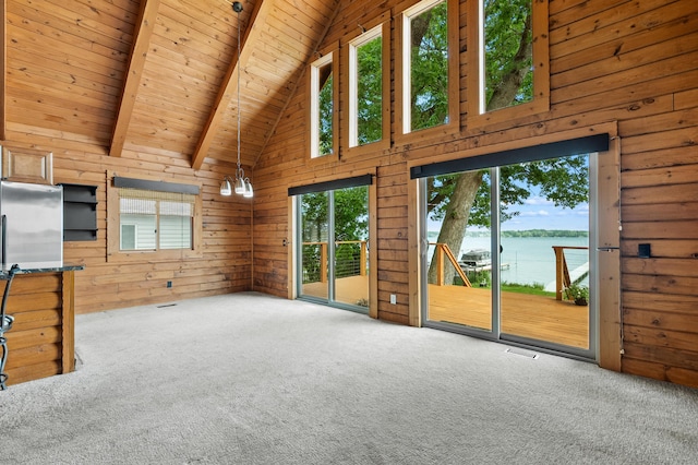 9715 Woodlawn Dr, Portage, MI 49002 - unfurnished living room with a water view, high vaulted ceiling, carpet, a wood ceiling with exposed beams, and wood walls
