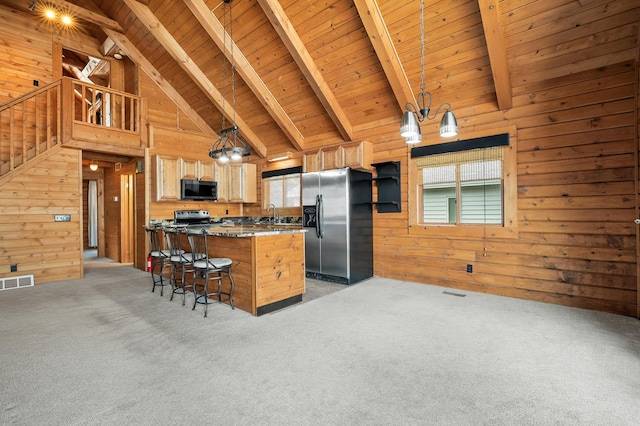 9715 Woodlawn Dr, Portage, MI 49002 - kitchen featuring black microwave, stainless steel fridge with ice dispenser, a wood ceiling with exposed beams, wood walls, and high vaulted ceiling