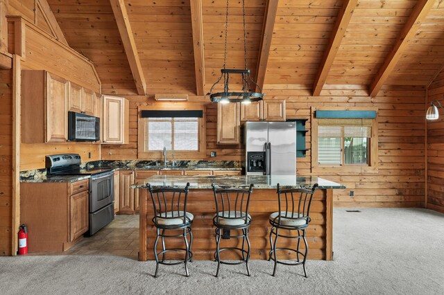 9715 Woodlawn Dr, Portage, MI 49002 - kitchen featuring appliances with stainless steel finishes, light colored carpet, plenty of natural light, wooden ceiling, and wood walls