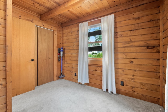 9715 Woodlawn Dr, Portage, MI 49002 - unfurnished bedroom featuring carpet flooring, a wooden ceiling with exposed beams, wooden walls, and a closet