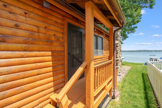 9715 Woodlawn Dr, Portage, MI 49002 - wooden deck featuring a water view and a yard
