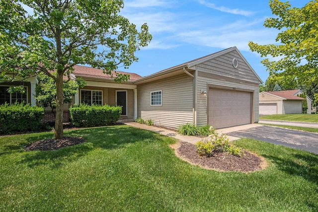 2663 Weatherby Hills Dr SE, Grand Rapids, MI 49546 - ranch-style home featuring a front yard and a garage