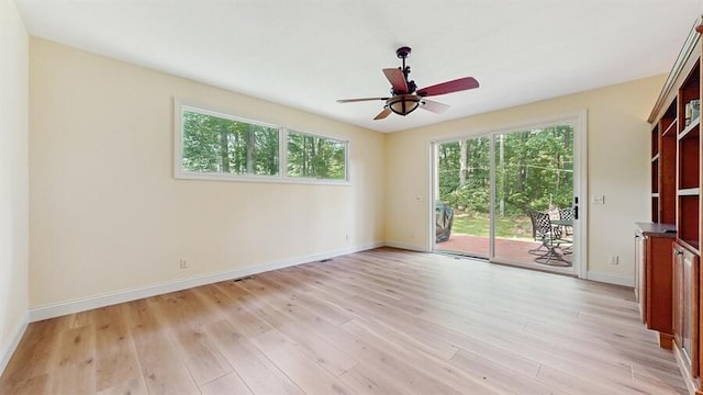 5026 Weatherford Dr, Coloma, MI 49038 - spare room with light wood-type flooring and a ceiling fan