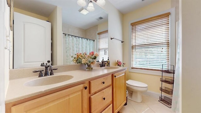 5026 Weatherford Dr, Coloma, MI 49038 - bathroom featuring double vanity, tile patterned flooring, and curtained shower