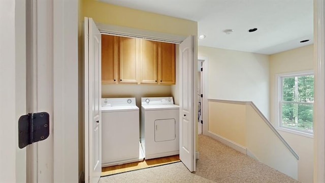 5026 Weatherford Dr, Coloma, MI 49038 - laundry area with washer and dryer, cabinet space, and recessed lighting
